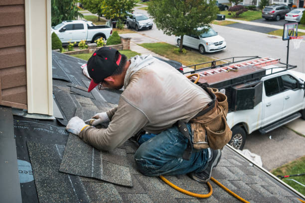 Professional Flat Roof Repair technician working in New Gloucester, ME